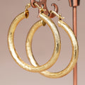 Women's Wave-Pattern Circle Clip Earrings